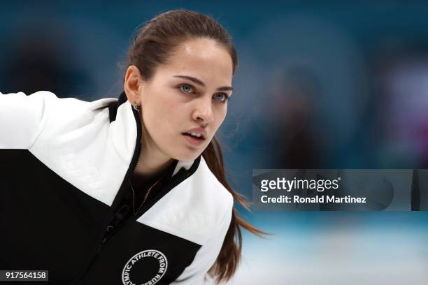Anastasia Bryzgalova of Olympic Athletes from Russia delivers a stone against Norway during the Curling Mixed Doubles Bronze Medal Game on day four...