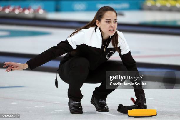 Anastasia Bryzgalova of Olympic Athletes from Russia delivers a stone against Norway during the Curling Mixed Doubles Bronze Medal Game on day four...