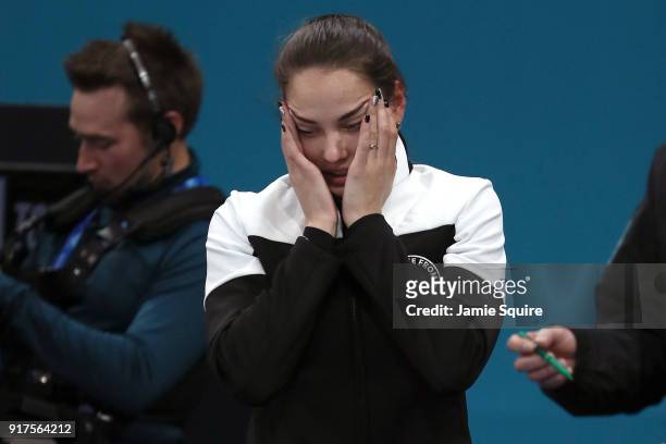 Anastasia Bryzgalova of Olympic Athletes from Russia reacts after defeating Norway to win the bronze medal during the Curling Mixed Doubles Bronze...