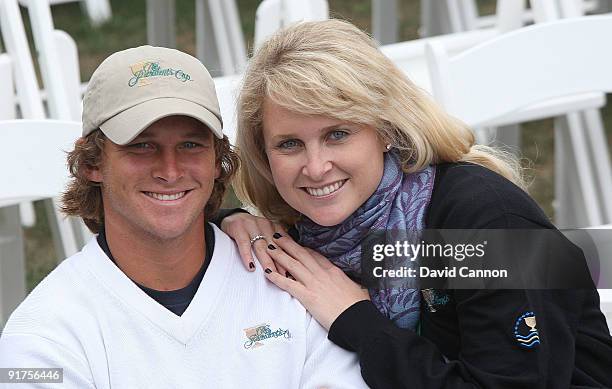 Gregory and Morgan Leigh Norman pose for a photo at the closing ceremonies after the Final Round Singles Matches of The Presidents Cup at Harding...