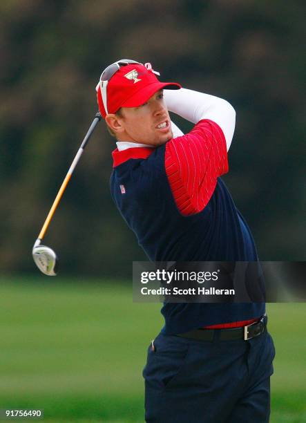 Hunter Mahan of the USA Team hits a bunker shot on the first hole during the Final Round Singles Matches of The Presidents Cup at Harding Park Golf...