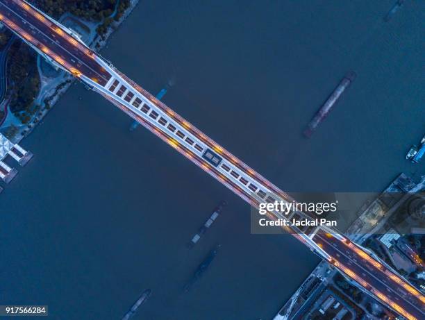 aerial view of shanghai lupu bridge at night - shanghai bridge stock pictures, royalty-free photos & images