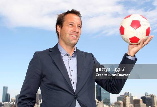 Newly appointed Melbourne Heart coach John van't Schip poses after a media conference to announce his appointment at the new A-League team at the...