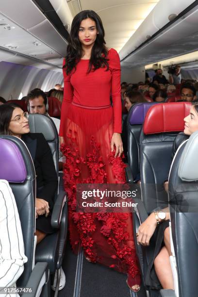 Kelly Gale showcases designs by Ginger & Smart during Australia's first on board fashion show Virgin Australia Runway in the Sky on February 13, 2018...