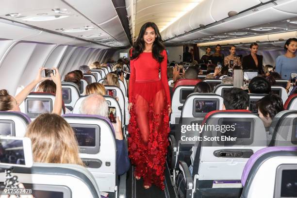 Kelly Gale showcases designs by Ginger & Smart during Australia's first on board fashion show Virgin Australia Runway in the Sky on February 13, 2018...