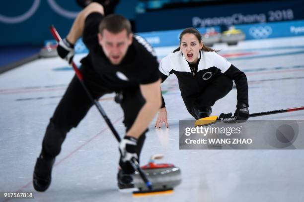 Russia's Anastasia Bryzgalova shouts for instructions during the curling mixed doubles bronze medal game during the Pyeongchang 2018 Winter Olympic...