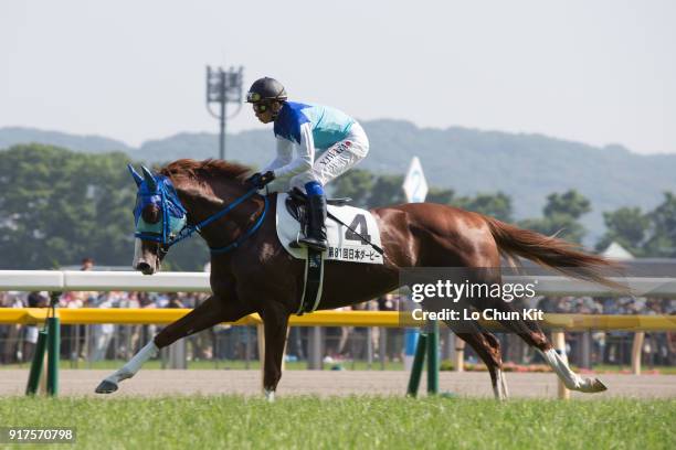 Jockey Yasunari Iwata riding Admire Deus during the Tokyo Yushun at Tokyo Racecourse on June 1, 2014 in Tokyo, Japan. Tokyo Yushun Japanese Derby, is...