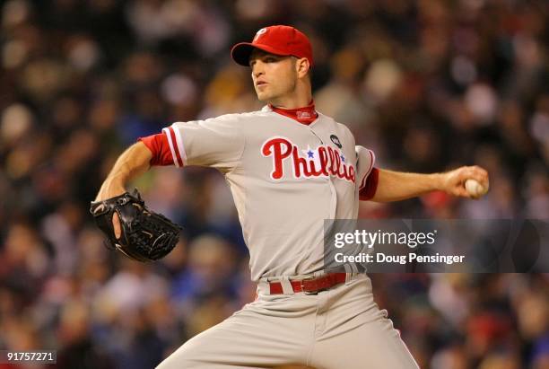 Happ of of the Philadelphia Philliesthrows a pitch against the Colorado Rockies in Game Three of the NLDS during the 2009 MLB Playoffs at Coors Field...