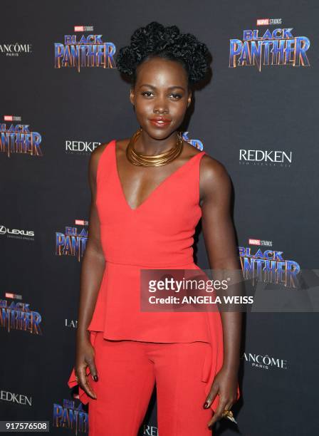Actress Lupita Nyong'o arrives for the MARVEL Black Panther fashion week celebration "Welcome to Wakanda" at Industria on February 12 in New York. /...