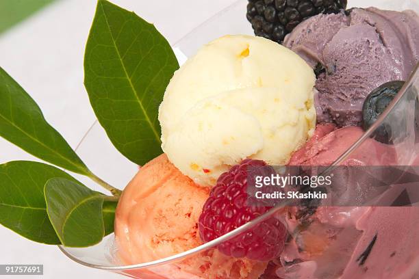 mixed ice cream - macro - orange sorbet stock pictures, royalty-free photos & images