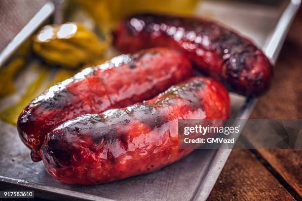 chorizo sausages with mustard - chorizo stock pictures, royalty-free photos & images