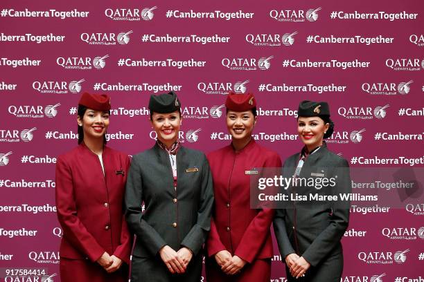 Qatar Airways cabin crew greet media during the Canberra Launch press conference on February 13, 2018 in Canberra, Australia. Qatar Airways launched...