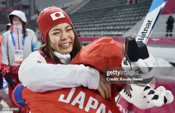 Sara Takanashi of Japan bursts into tears after winning the bronze medal in the women's normal hill individual ski jumping at the Pyeongchang Winter...