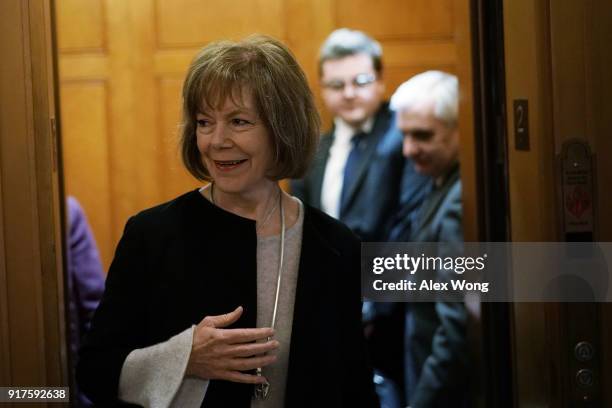 Sen. Tina Smith arrives for a vote at the Capitol February 12, 2018 in Washington, DC. The Senate has passed a procedural vote today to begin debate...
