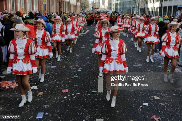 Majorettes from the Ebersheimer Carneval-Verein Die Römer march in the parade. Around half a million people lined the streets of Mainz for the...