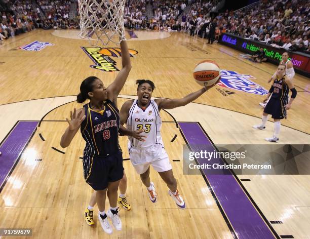 Cappie Pondexter of the Phoenix Mercury lays up a shot past Tammy Sutton-Brown of the Indiana Fever in Game Five of the 2009 WNBA Finals at US...