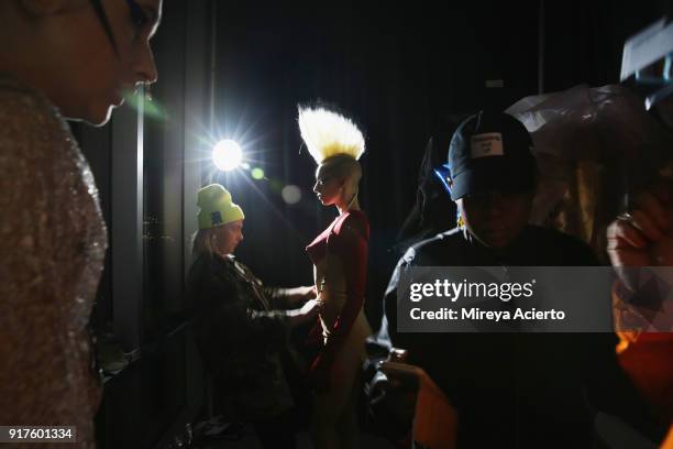 Model prepares backstage during the Kaimin fashion show at the Glass Houses on February 12, 2018 in New York City.