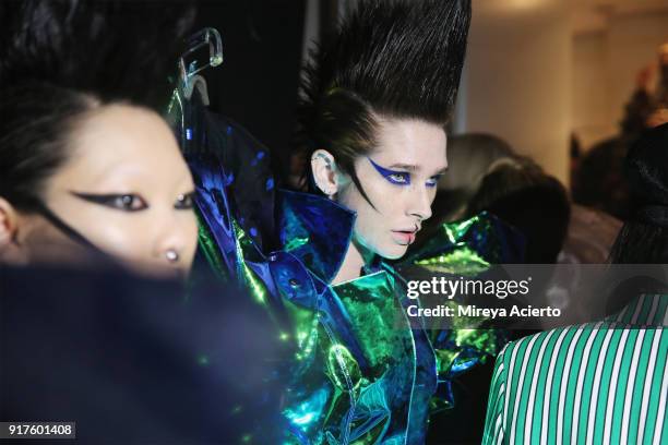 Model prepares backstage during the Kaimin fashion show at the Glass Houses on February 12, 2018 in New York City.