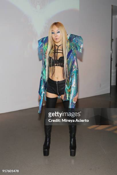 Fashion designer, Kaimin poses backstage before the Kaimin fashion show at the Glass Houses on February 12, 2018 in New York City.