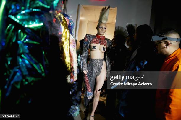 Model prepares backstage during the Kaimin fashion show at the Glass Houses on February 12, 2018 in New York City.