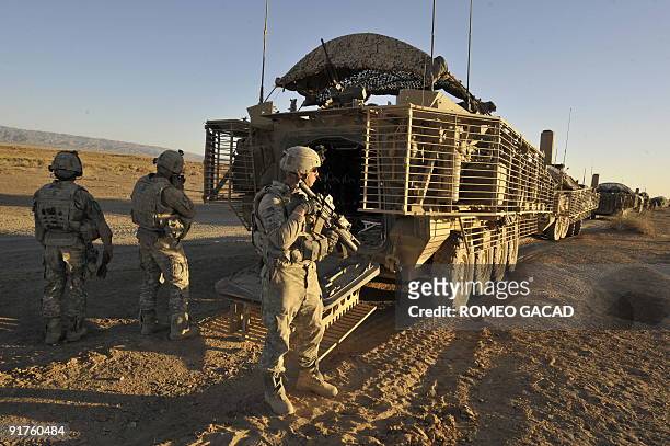 To go with Afghanistan-unrest-US-military-weapons,SCENE by Daphne BENOIT US Army soldiers from the 3rd Platoon, Charlie Company, 1st Infantry...