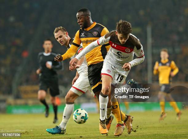 Bernd Nehrig of St. Pauli, Erich Berko of Dresden and Luca-Milan Zander of St. Pauli battle for the ball during the Second Bundesliga match between...