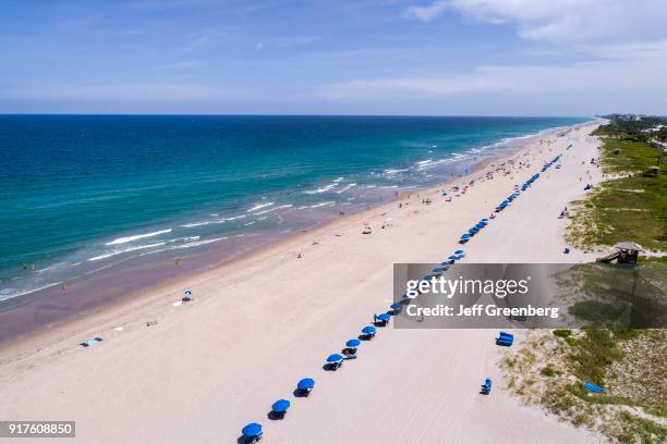 Florida, Delray Beach, Atlantic Ocean with beach umbrellas.