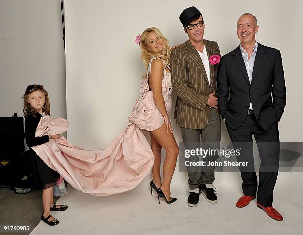 Adelaide Gault, actress Pamela Anderson, photographer David LaChapelle, and publisher Benedikt Taschen pose for a portrait at Hollywood Life's 6th...