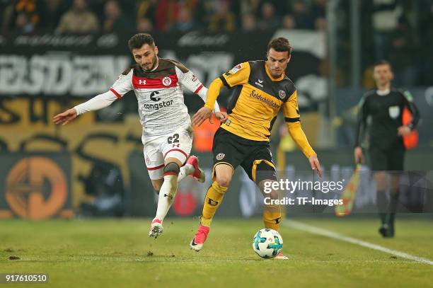 Cenk Sahin of St. Pauli and Philip Heise of Dresden battle for the ball during the Second Bundesliga match between SG Dynamo Dresden and FC St. Pauli...