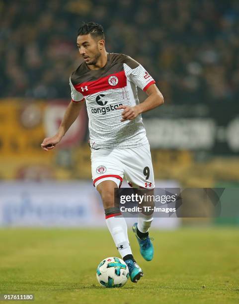 Aziz Bouhaddouz of St. Pauli controls the ball during the Second Bundesliga match between SG Dynamo Dresden and FC St. Pauli at DDV-Stadion on...