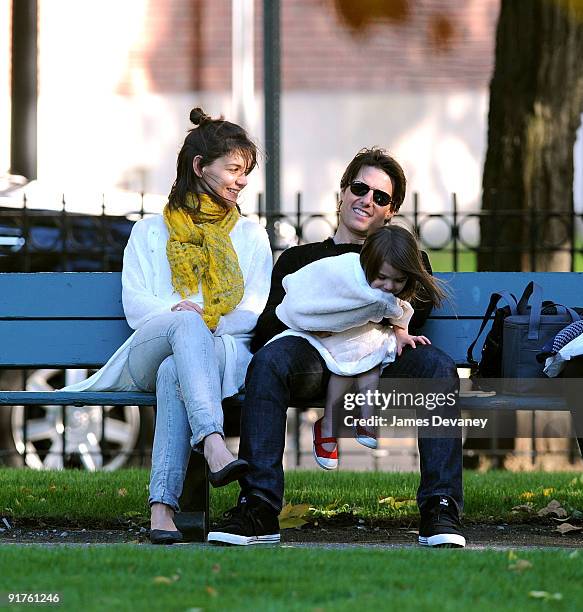 Katie Holmes, Suri Cruise and Tom Cruise visit Charles River Basin on October 10, 2009 in Cambridge, Massachusetts.