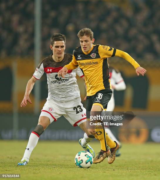 Johannes Flum of St. Pauli and Niklas Hauptmann of Dresden battle for the ball during the Second Bundesliga match between SG Dynamo Dresden and FC...