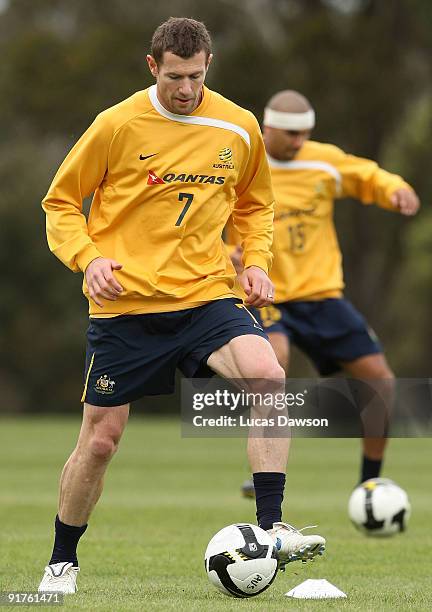 Brett Emerton of the Socceroos controls the ball at an Australian Socceroos training session at Monash University on October 12, 2009 in Melbourne,...