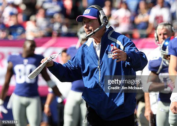 Head coach Tom Coughlin of the New York Giants looks on against the Oakland Raiders during their game on October 11, 2009 at Giants Stadium in East...