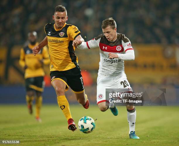 Paul Seguin of Dresden and Richard Neudecker of St. Pauli battle for the ball during the Second Bundesliga match between SG Dynamo Dresden and FC St....