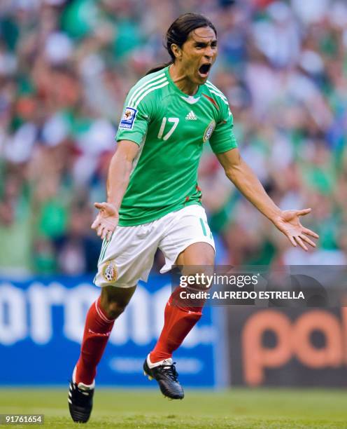 Mexican player Francisco Palencia celebrates his goal against El Salvador, during their FIFA World Cup South Africa-2010 qualifier football match, at...