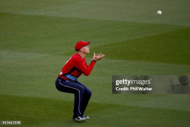 Sam Billings of England takes a catch to dismiss Colin Munro of the Blackcaps during the International Twenty20 match between New Zealand and England...