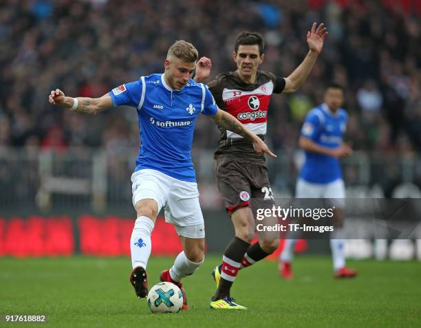 Felix Platte of Darmstadt and Johannes Flum of St. Pauli battle for the ball during the Second Bundesliga match between FC St. Pauli and SV Darmstadt...