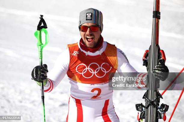 Marcel Hirscher of Austria celebrates winning gold at the finish during the Men's Alpine Combined Slalom on day four of the PyeongChang 2018 Winter...