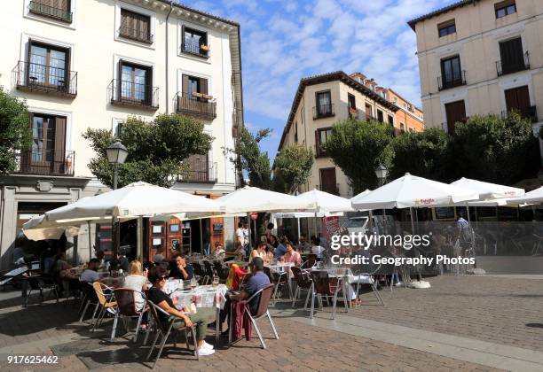 Pavement street cafe in Plaza de San Ildefonso square, Malasana, Madrid city centre, Spain.