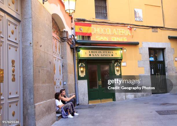 Chocolateria San Gines famous chocolate drink and churros cafe, Madrid city centre, Spain opened 1894.