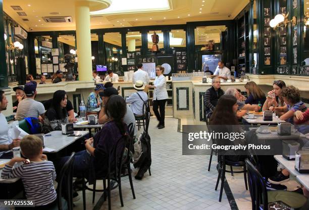 Chocolateria San Gines famous chocolate drink and churros cafe, Madrid city centre, Spain opened 1894.