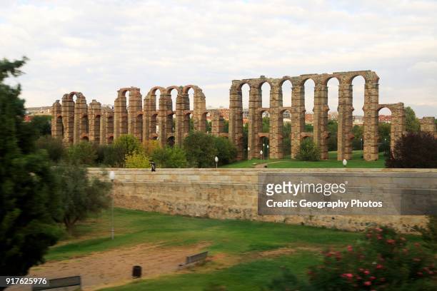 Blurred motion shot from speeding train of Roman aqueduct, Acueducto de Los Milagros, Merida, Extremadura, Spain.