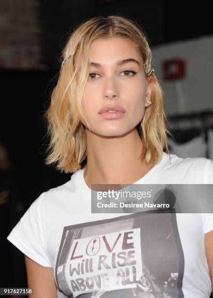 Hailey Baldwin poses backstage for the Zadig & Voltaire fashion show during New York Fashion Week at Cedar Lake Studios on February 12, 2018 in New...