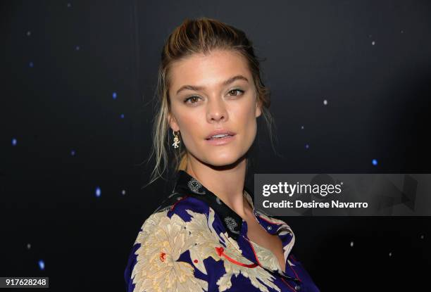 Nina Agdal poses backstage at the Zadig & Voltaire fashion show during New York Fashion Week at Cedar Lake Studios on February 12, 2018 in New York...