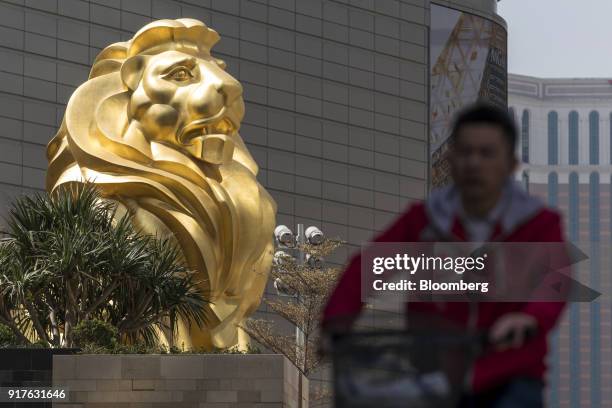 Lion statue stands outside of the MGM Cotai casino resort, developed by MGM China Holdings Ltd., in Macau, China, on Tuesday, Feb. 13, 2017. MGM...