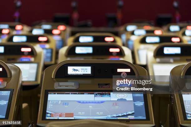 Gaming machines stand on the floor of the casino at the MGM Cotai casino resort, developed by MGM China Holdings Ltd., in Macau, China, on Tuesday,...
