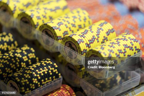 Gaming chips sit in trays on the floor of the casino at the MGM Cotai casino resort, developed by MGM China Holdings Ltd., in Macau, China, on...
