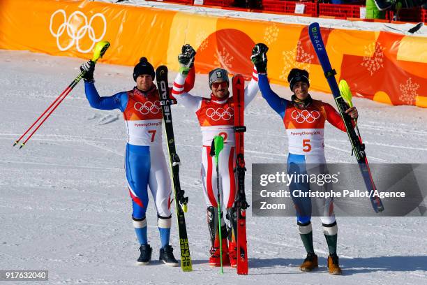 Marcel Hirscher of Austria wins the gold medal, Alexis Pinturault of France wins the silver medal, Victor Muffat-jeandet of France wins the bronze...