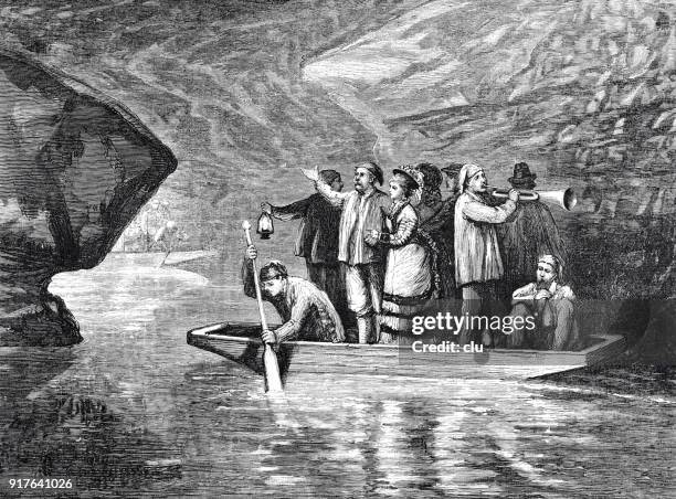 the mammoth cave in kentucky: people in a boat - mammoth cave stock illustrations